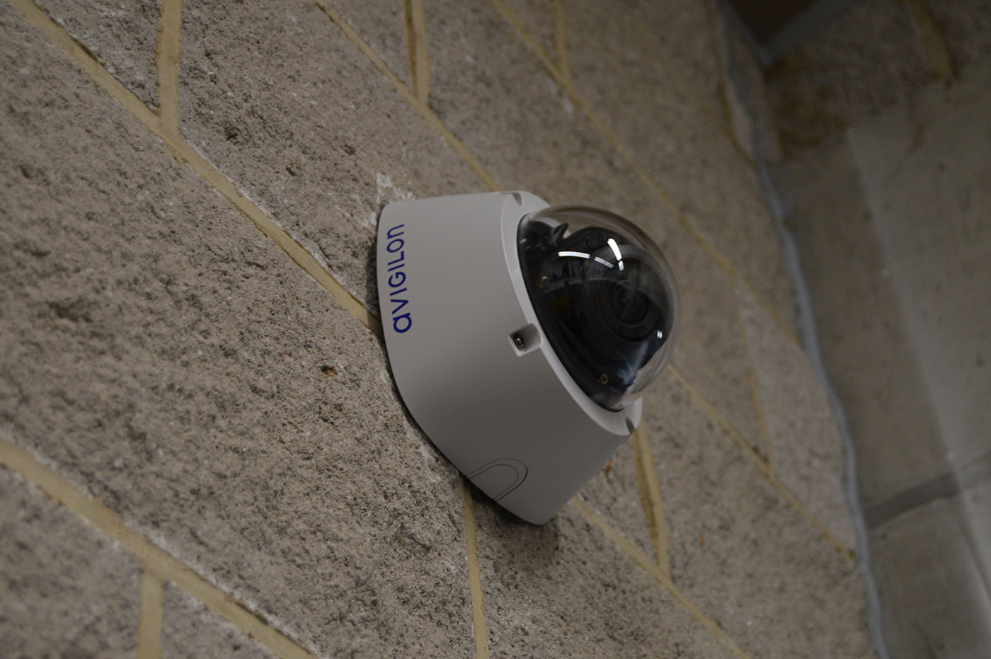 A CCTV camera mounted on a wall at Grand Arcade Shopping Centre in Cambridge.
